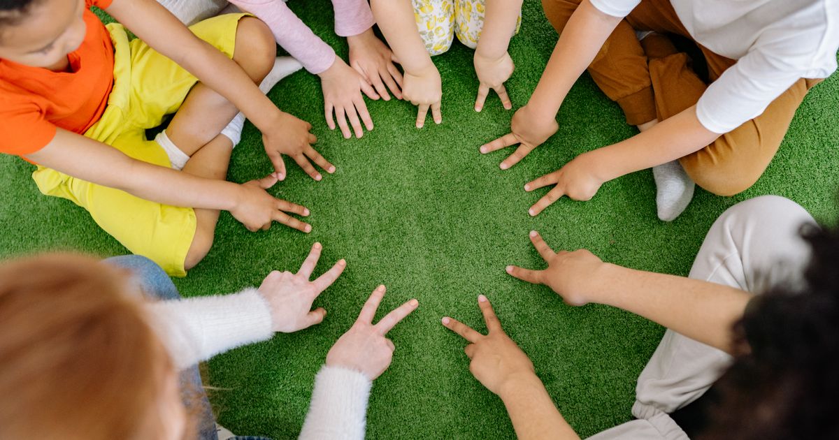 Parent supporting a child with learning activities at home